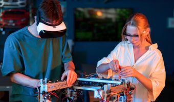 teens-doing-experiments-robotics-laboratory-boy-vr-headset-girl-protective-glasses_1268-23732