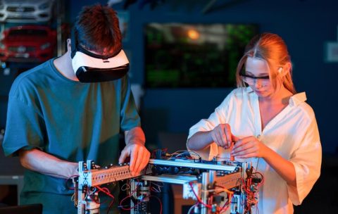 teens-doing-experiments-robotics-laboratory-boy-vr-headset-girl-protective-glasses_1268-23732